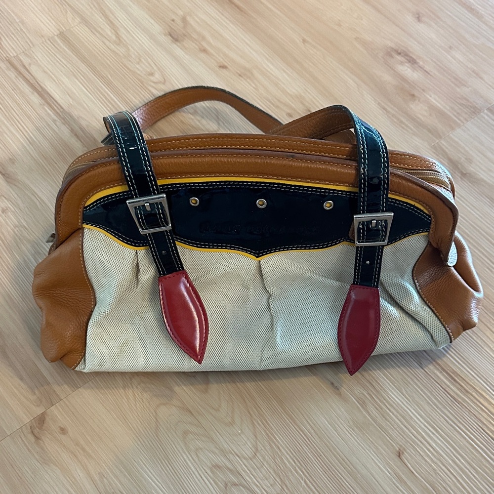 Elegant Tan and Cream Shoulder Bag with Red Accents
